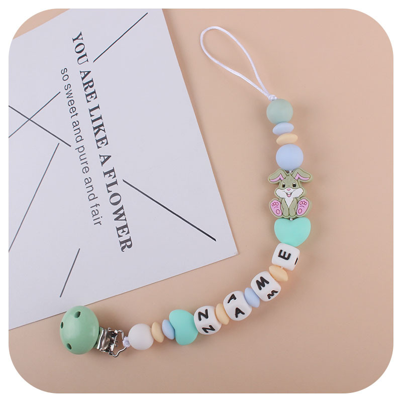 El Comercio exterior nueva cadena de chupete de conejo de silicona suministros para bebés personalizable nombre del bebé cadena anti-caída