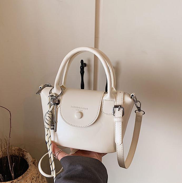 Bolso de mano retro coreano para mujeres 2025 nuevo estilo simple bolso de hombro de moda nicho de alta calidad bolso de mochila