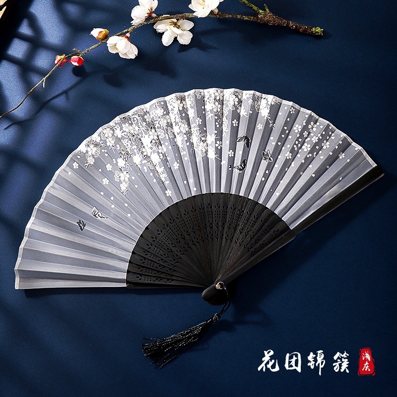 古代のチャイナドレスの女性の漢服の子供のダンスの桜の扇の中国風の夏は桃の花の扇子を身につけて古風を扇に折ります。|undefined