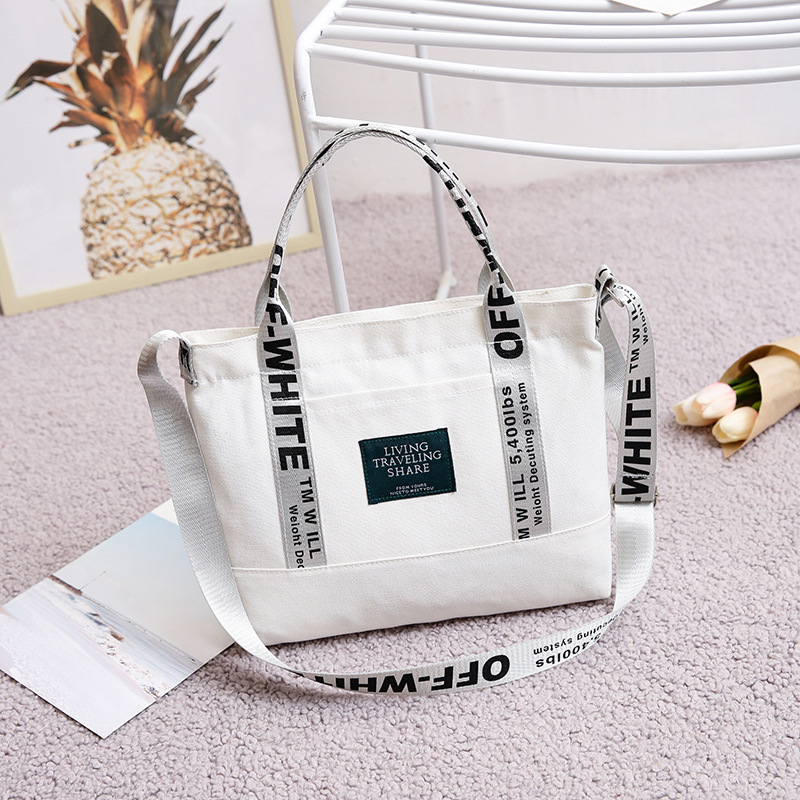 Versión coreana del bolso japonés fresco para mujer, bolso de lona, bolso de mensajero portátil de un solo hombro grueso, bolso popular de estilo literario