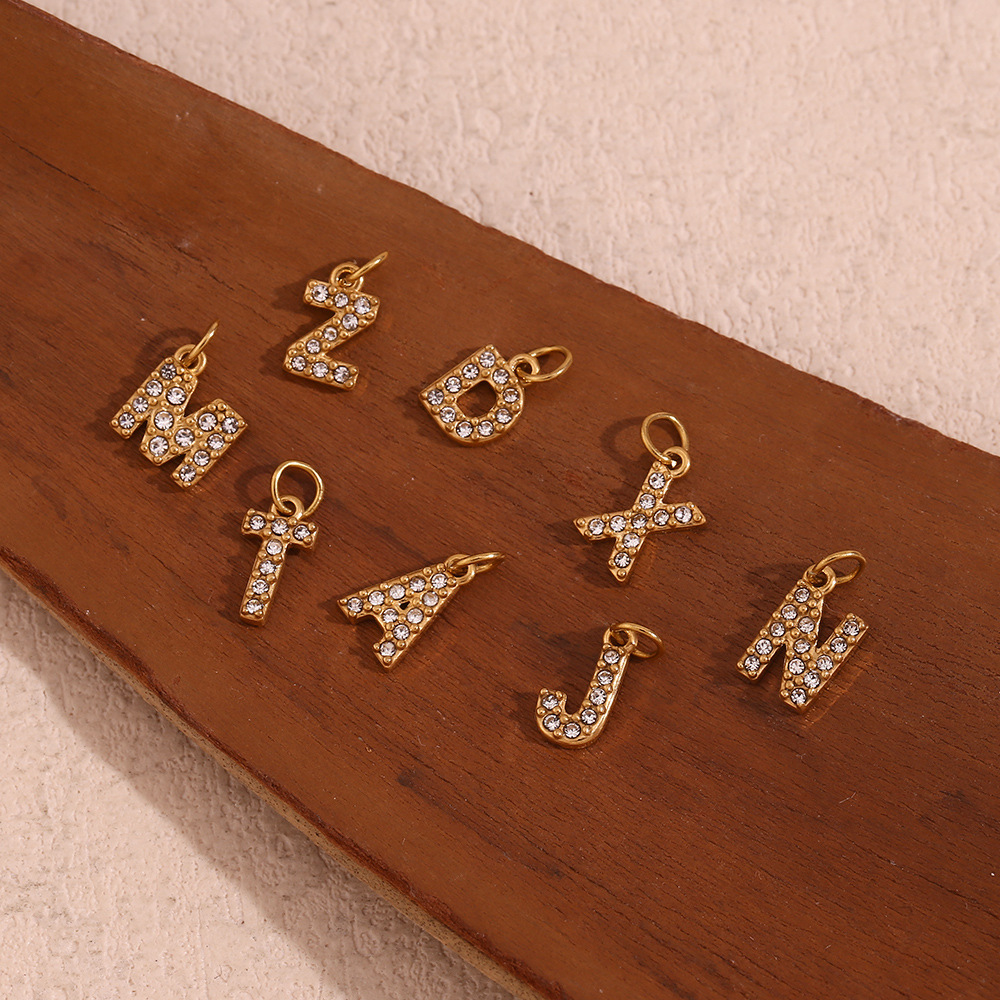 European and American niche fashion simple explosive jewelry accessories stainless steel plated 18K gold mini rhinestone letter pendant