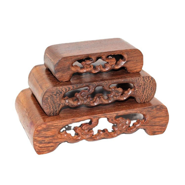 A redwood carved jade, agate, and zisha teapot, snuff bottle, and handicraft decorative piece with a solid wood rectangular base, bookshelf stand.