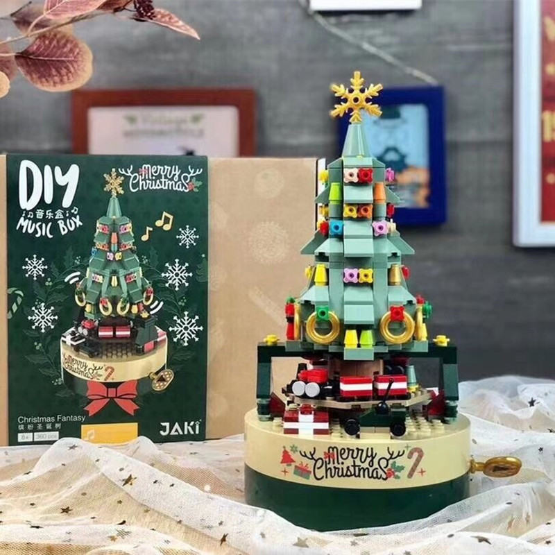Caja de música de Navidad senbao bloques de construcción de cristal árbol de Navidad creativo juguetes educativos ensamblados regalos de vacaciones al por mayor y al por menor