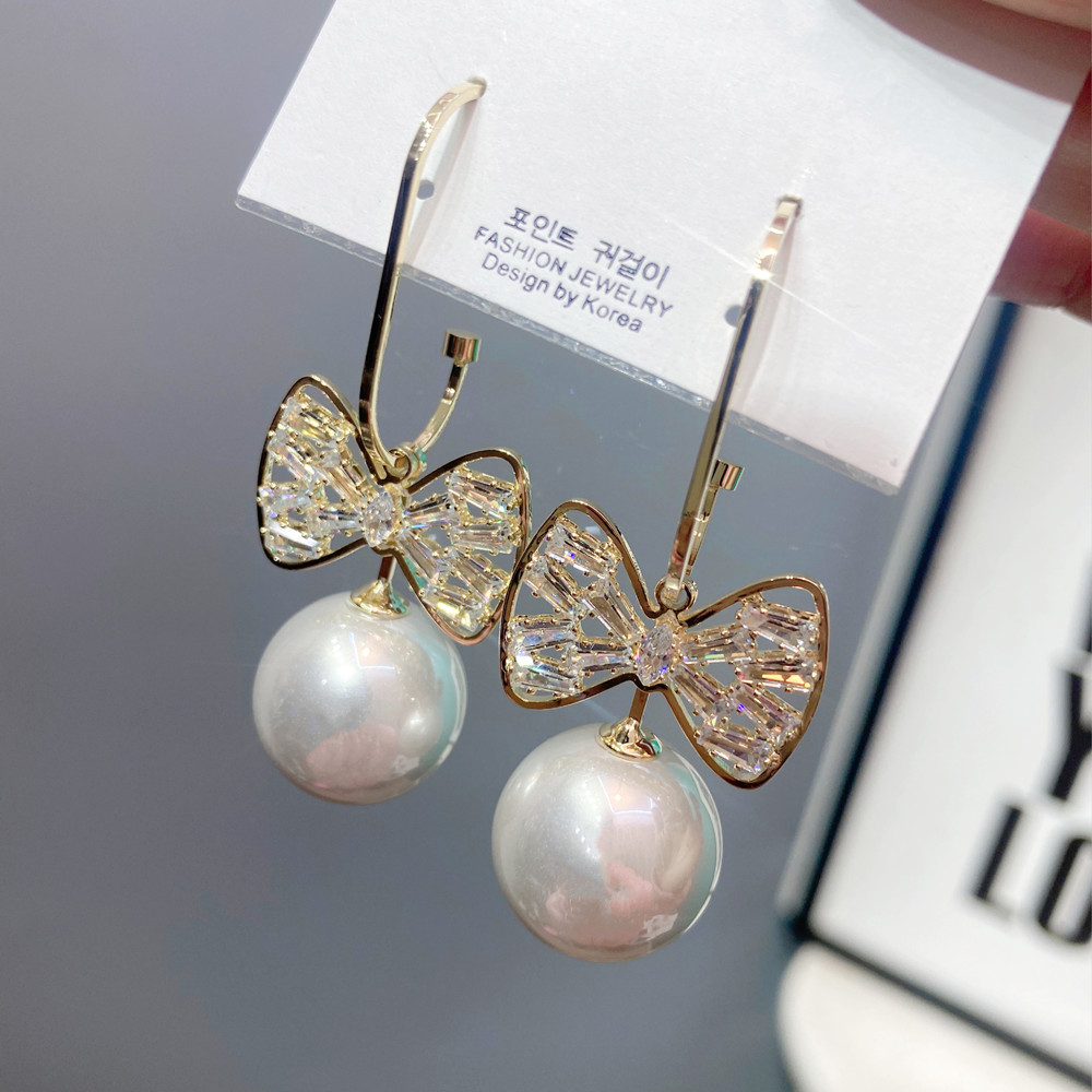 Korean Bowknot Pearl Earrings display picture 4