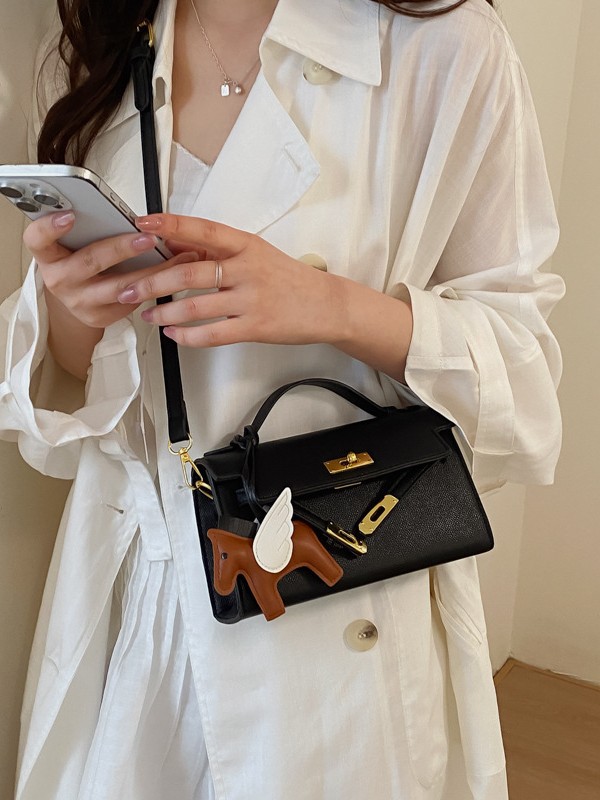 La sensación de alta calidad de la bolsa portátil Kelly 2026 nuevo estilo de lichi estampado moda ligero lujoso ocio mochila de hombro
