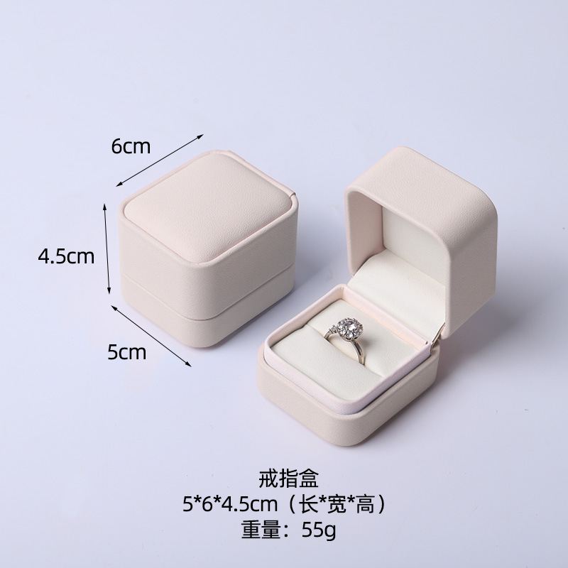 Caja de joyería rosa de alta calidad de cuero pu caja de embalaje de marca de joyería logotipo colgante pulsera collar caja de anillo