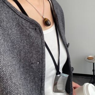 Sunflower Oni Same silver Stainless Steel Color-free Comb Necklace Design Sense Black Rope Woolen Chain Accessories Women