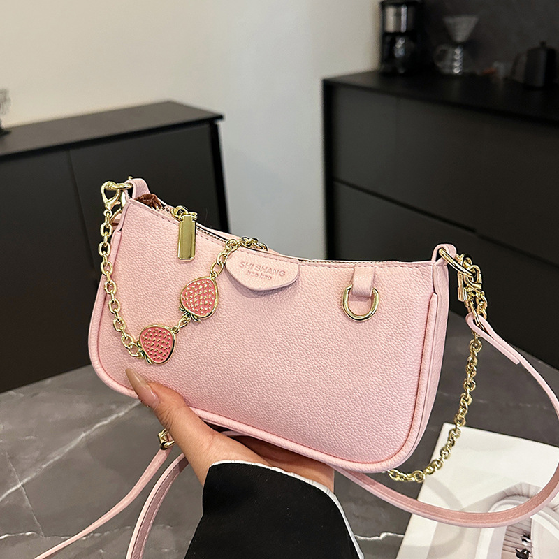 Bolso de cadena popular de este año, nuevo bolso femenino de primavera 2025, bolso de hombro con patrón de lichi fresco, bolso de mensajero de fresa lindo