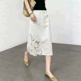 高腰镂空时尚直筒半身裙女2026夏季新款显瘦时尚设计感百搭中长裙