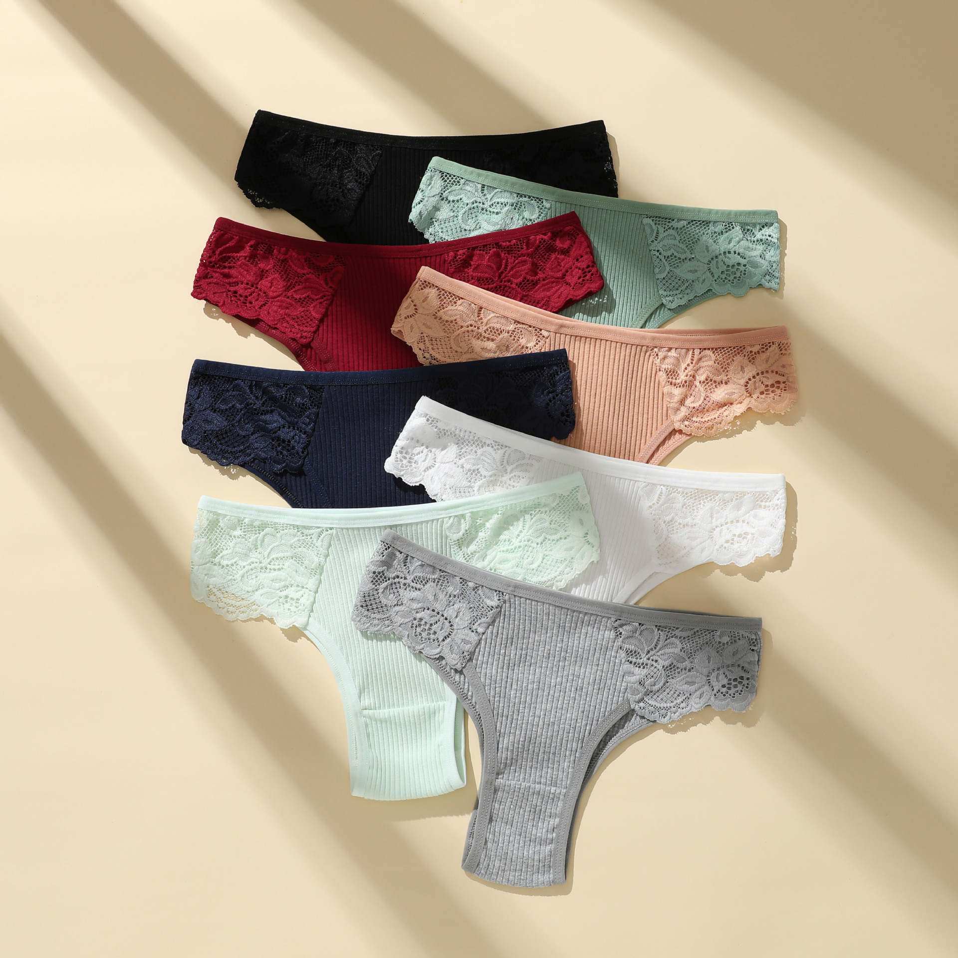 Nuevos calzoncillos de mujer con hilo de algodón puro, de color sólido, cintura baja, encaje transpirable, de doble capa, suministrados directamente por el fabricante de calzoncillos de mujer.