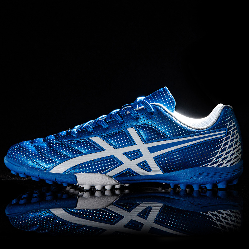 Zapatos de fútbol para hombres y mujeres estudiantes adolescentes AG clavos largos entrenamiento de carreras de clavos al por mayor tecnología ventilada para adolescentes