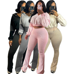 HR25016欧米の婦人服のツイストパーカーは帽子のラッパのズボンの2つのセットをつなぎ合わせます。