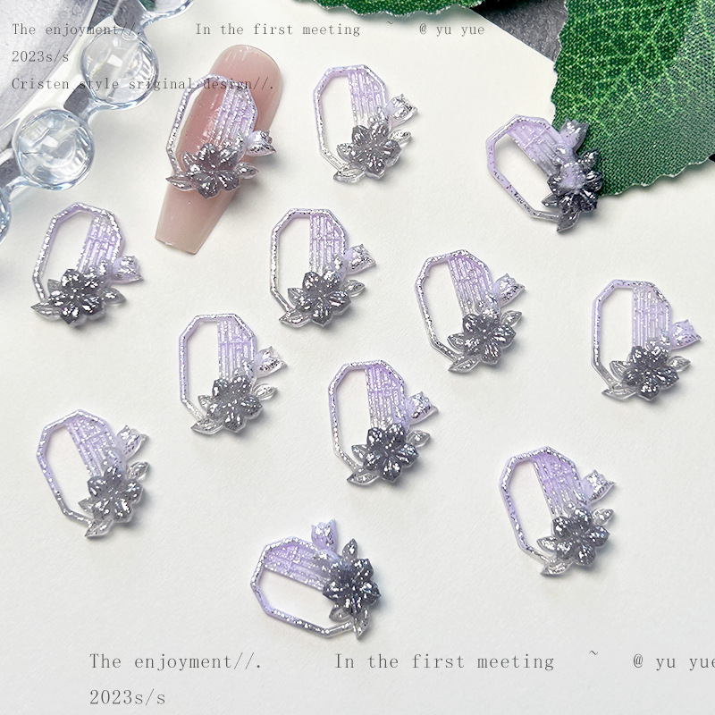 Nueva joyería de uñas de estilo gris-púrpura salvaje de estilo ins mezclada luminosa tridimensional de flores pequeñas accesorios de armadura al por mayor