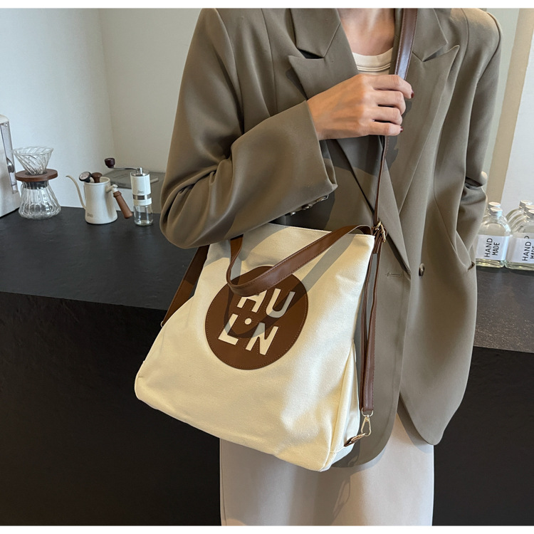 Korean letter printed multi-purpose cloth bag, 2024 new style, high-quality student backpack, commuting single-shoulder bag undefined