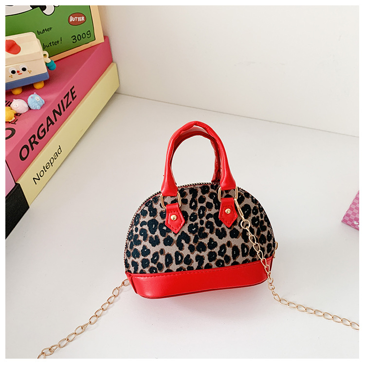 Exquisita y compacta bolsa de niña estampado leopardo extranjero mini bolso de cadena bebé nuevo estilo coreano bolso de conchas para niños