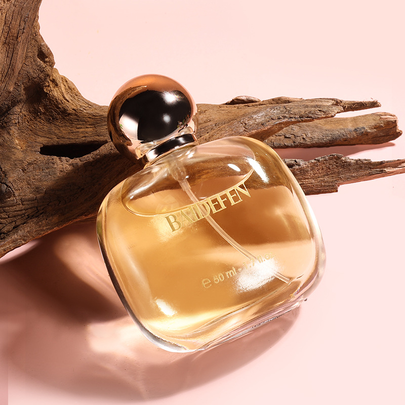 Fabricante al por mayor nuevo polvo de encuentro de fragancia de damas fresca dulce fragancia de flores ligeras fragancia de red duradera con el mismo perfume