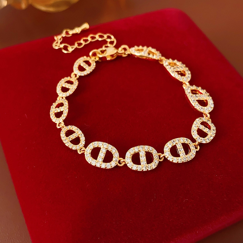 Zircon nariz de cerdo empalme pulsera de fijación de moda personalidad fría pulsera de viento ligero lujo nicho de alta calidad joyas de mano para mujeres