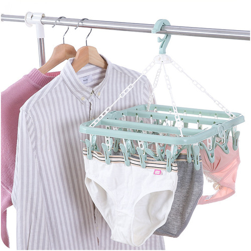 32 clips 0 folding clothes hanger adult windproof clothes drying rack household plastic children's socks clothes drying rack wholesale