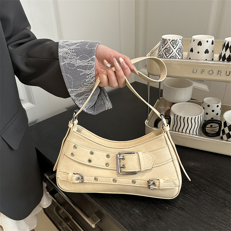 Transfronterizo 2025 primavera y verano nuevo estilo de alta calidad diseño de nicho bolso de viaje diario de un solo hombro bolso de axila con decoración de cinturón