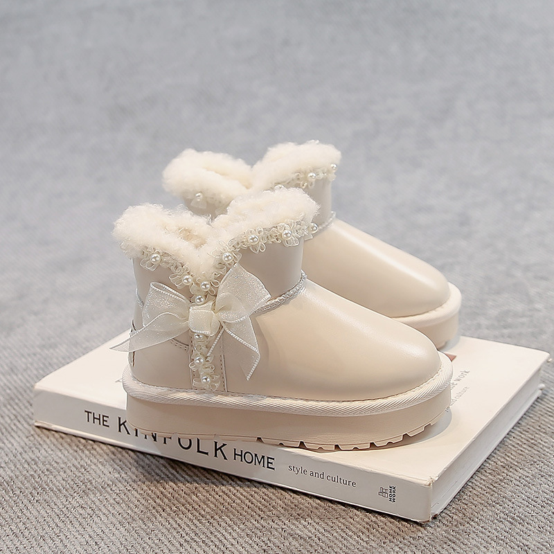 Zapatos de algodón princesa de arco de niñas para niños botas de nieve de lana de invierno 2025 nuevas niñas zapatos de algodón gruesos