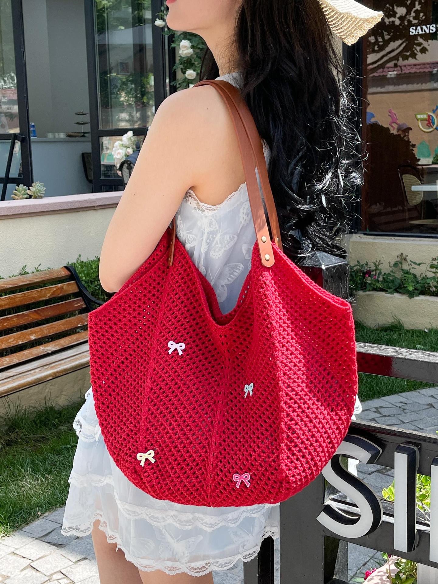 Viaje junto al mar estilo vacaciones bolso de playa tejido hueco mujer 2025 verano nuevo bolso tejido de paja bolso de alta capacidad