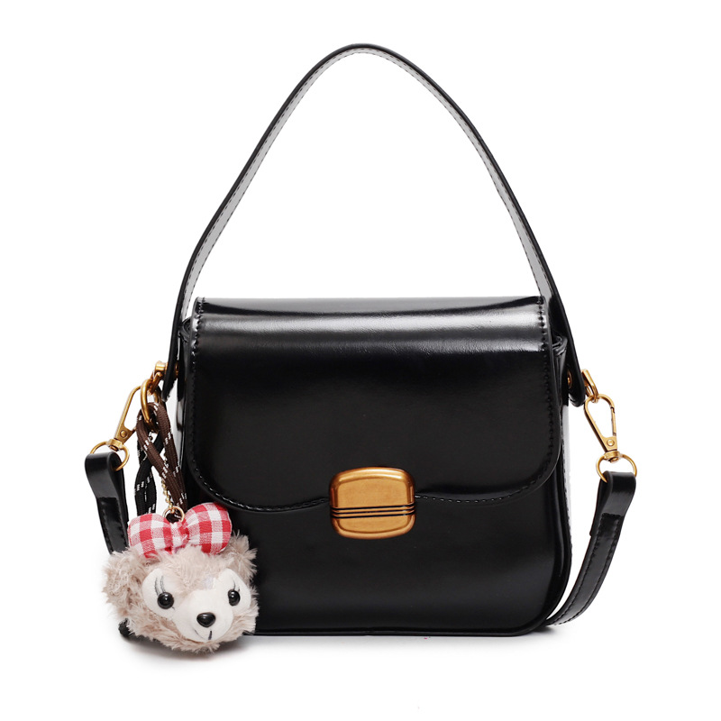 Bolso de tendencia popular de comercio exterior para mujeres 2025, nueva moda extranjera simple bolso de hombro de alta sensación bolso pequeño