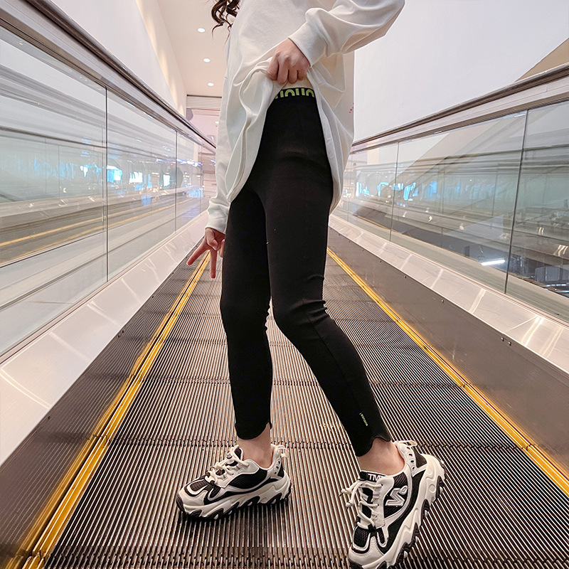 Polainas de las niñas de primavera y otoño nuevas niñas medias y grandes niños pantalones de todo fósforo ropa exterior de moda Pantalones de los niños de moda