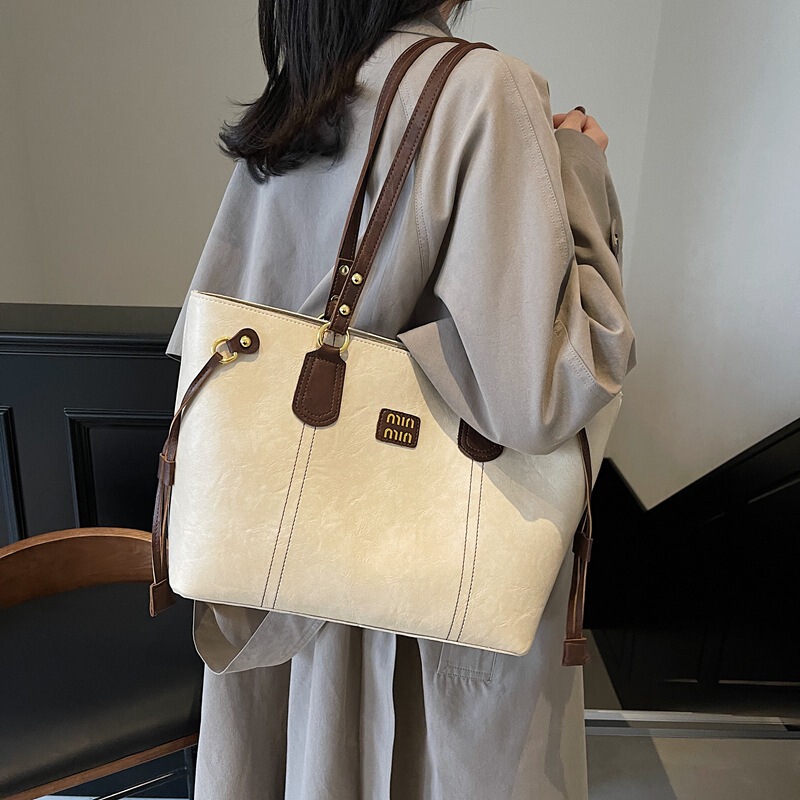 新しい大容量通勤トートバッグ女性のレトロファッション多用途ショルダーバッグハイエンドニッチトレンディなハンドバッグ|undefined