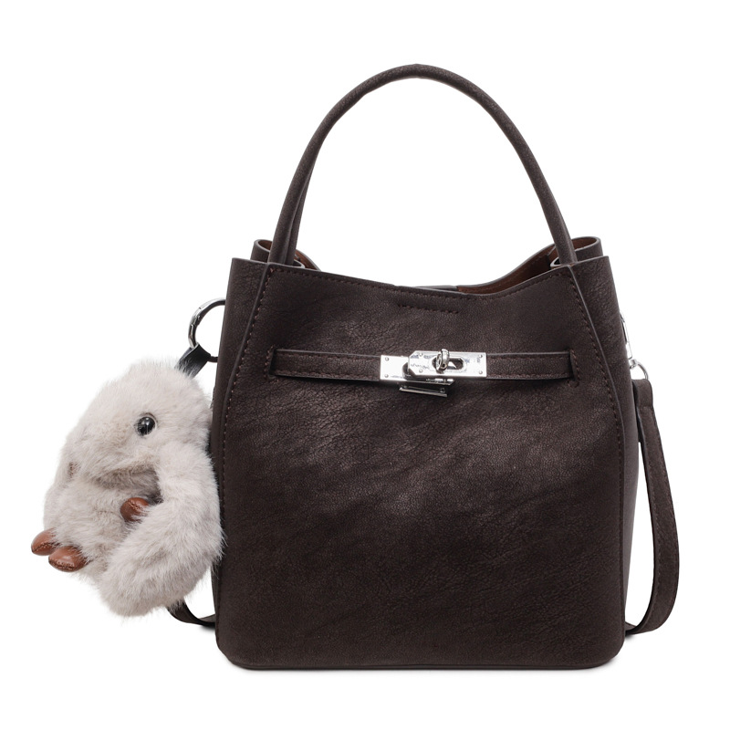 Transfronterizos otoño invierno hija bolsa retro versátil bolso de cubo portátil 2025 nuevo estilo de alta calidad sensación de hombro mochila moda