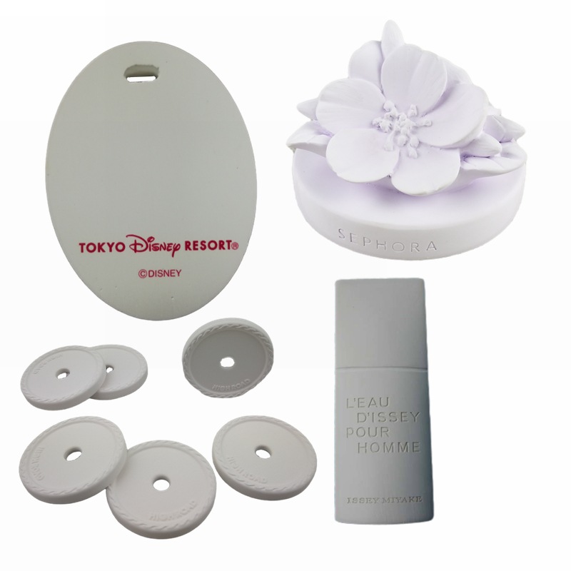 Perfume expandido personalizado Tabletas volátiles Tabletas de aromaterapia de cerámica Tabletas de aromaterapia a granel Colgante de aromaterapia de yeso Desodorización de coche de flores