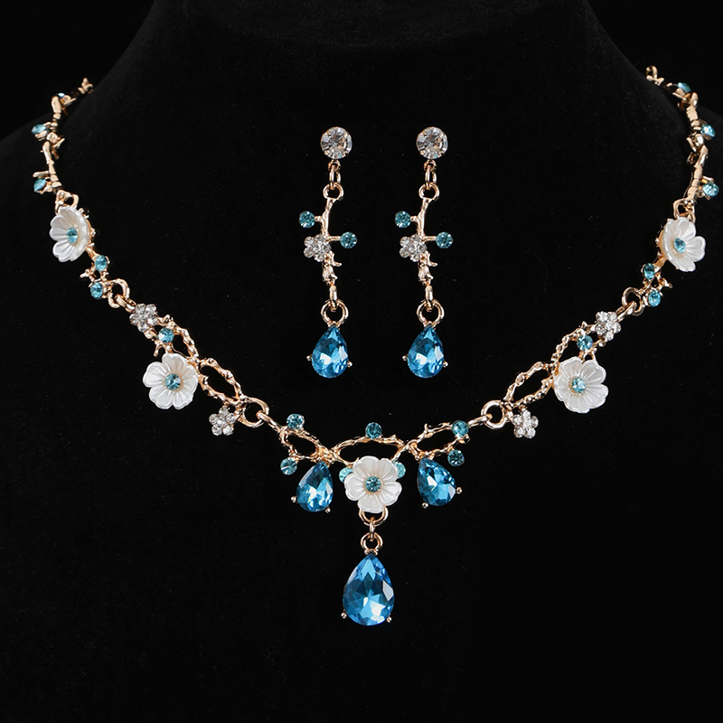 Gold base + lake blue diamond