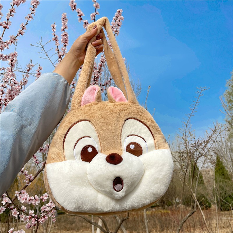 Venta al por mayor nuevo juguete de peluche fresa oso ardilla grande Satchel transfronterizo Comercio exterior muñeca bolsa grab máquina intercambio regalo