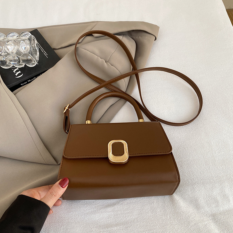 Bolso de diseño de nicho de alta gama para mujer 2025 nuevo bolso de mensajero de un solo hombro de moda de primavera y verano