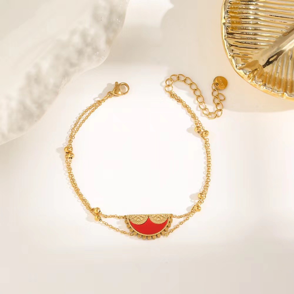 Pulsera de trébol de acero titanium vendedora caliente transfronteriza europea y americana con incrustaciones de concha pulsera colgante pulsera de diseño avanzado sin desvanecimiento al por mayor