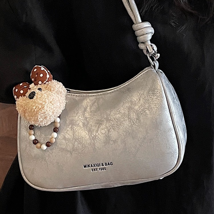 Bolsa de brazo de moda retro para mujeres 2026 primavera nueva simple diaria bolsa de bolsas de bolsillo de alto valor coreano hombro único