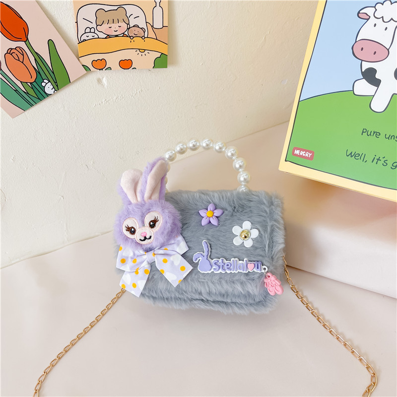 Chanel estilo princesa flor accesorios bolsa conejito bolso de hombro del niño Bolsa de felicitación de Año Nuevo estilo coreano bolsa de mensajero de los niños de dibujos animados