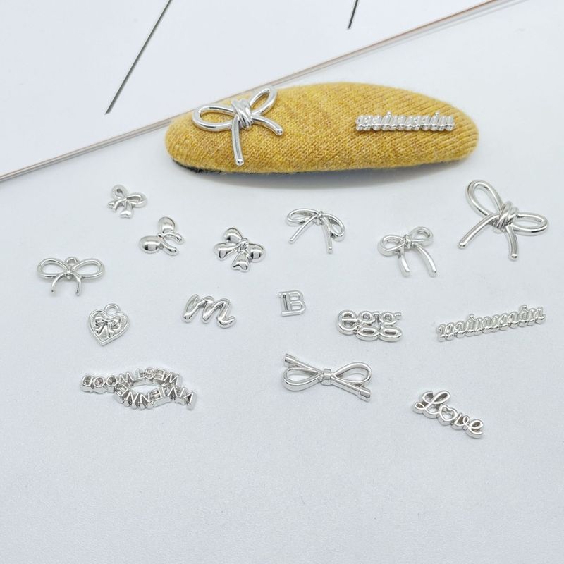 新しい電気メッキブライトシルバーリボンレター愛合金パッチペンダント diy ヘアピンブレスレットイヤリングアクセサリー|undefined