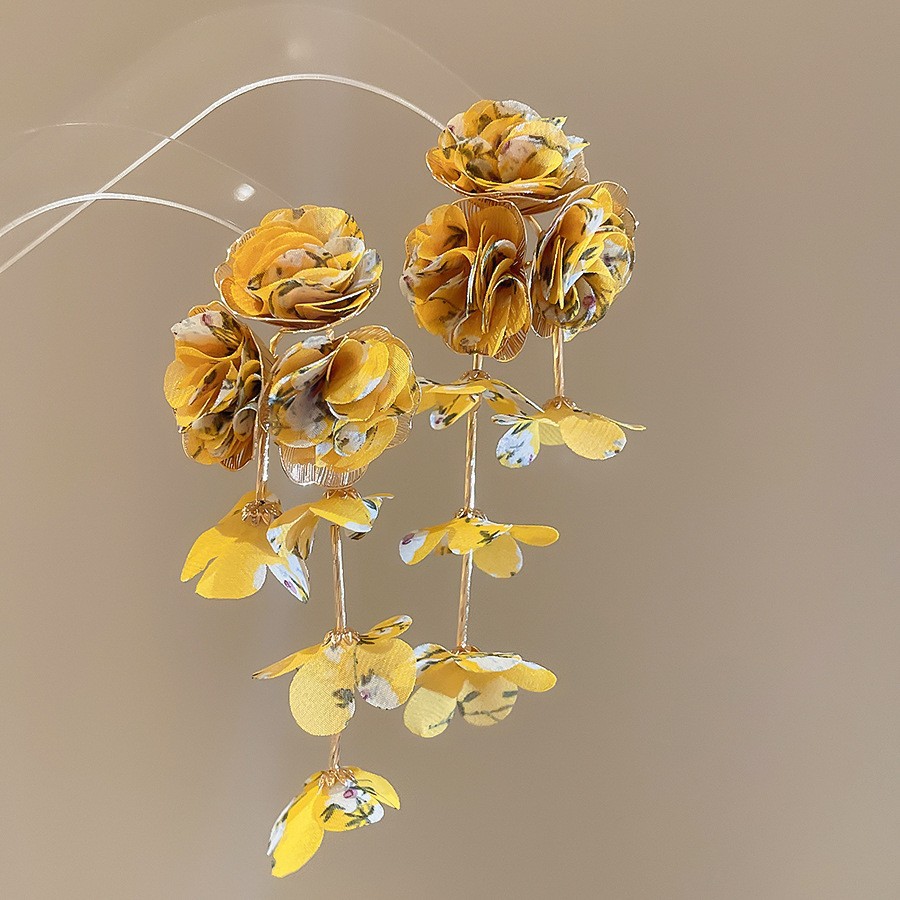 Pendientes de borla de flores de gasa de aguja de plata Pendientes de dopamina de bosque dulce Pendientes de todo fósforo de tendencia de nicho Mujeres al por mayor