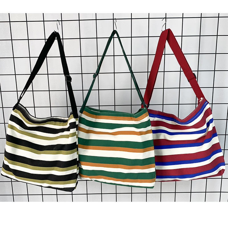 Nuevo Cruz-cuerpo bolsa de lona femenina de un solo hombro estudiante clase libro bolsa Bolsa de Comercio Exterior bolsa de la raya