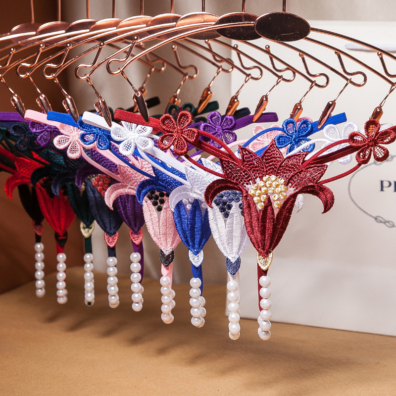 Sexy underwear sexy embroidered thong hollow pearl massage low waist elastic underwear temptation a generation of women