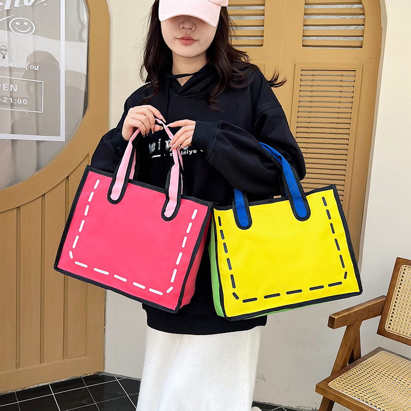 2023 nuevo bolso de lona de niña japonesa de dibujos animados bidimensional para mujer bolso de compras portátil a juego de color bolso de hombro de gran capacidad