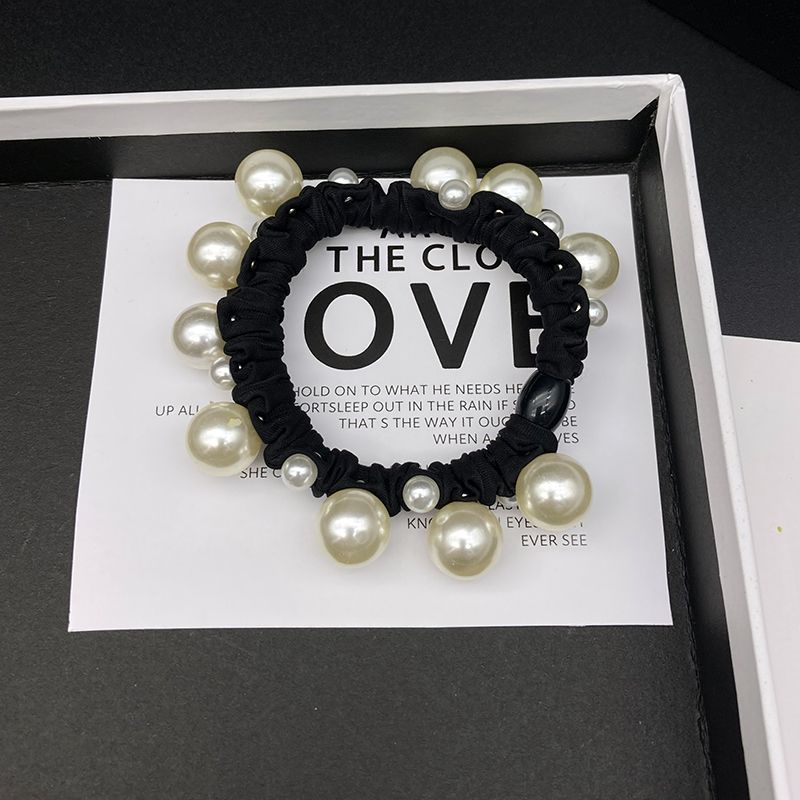 2025 nuevo estilo de cuerda de cabeza simple anillo de pelo de perlas anillo de intestino grande temperamento de alta elasticidad correa gruesa cuerda de pelo de mujer