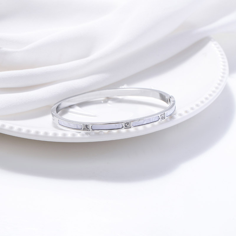 Nueva moda versátil simple brazalete de acero inoxidable de titanio de oro brazalete de diamante de oro brazalete de conchas detalles