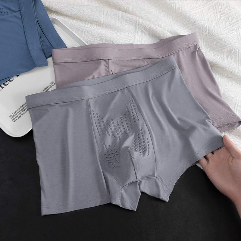 Nuevas calzoncillos de hombre, masaje de gránulos de ostrina, entrepierna antibacteriana, pantalones de cintura mediana para hombres al por mayor