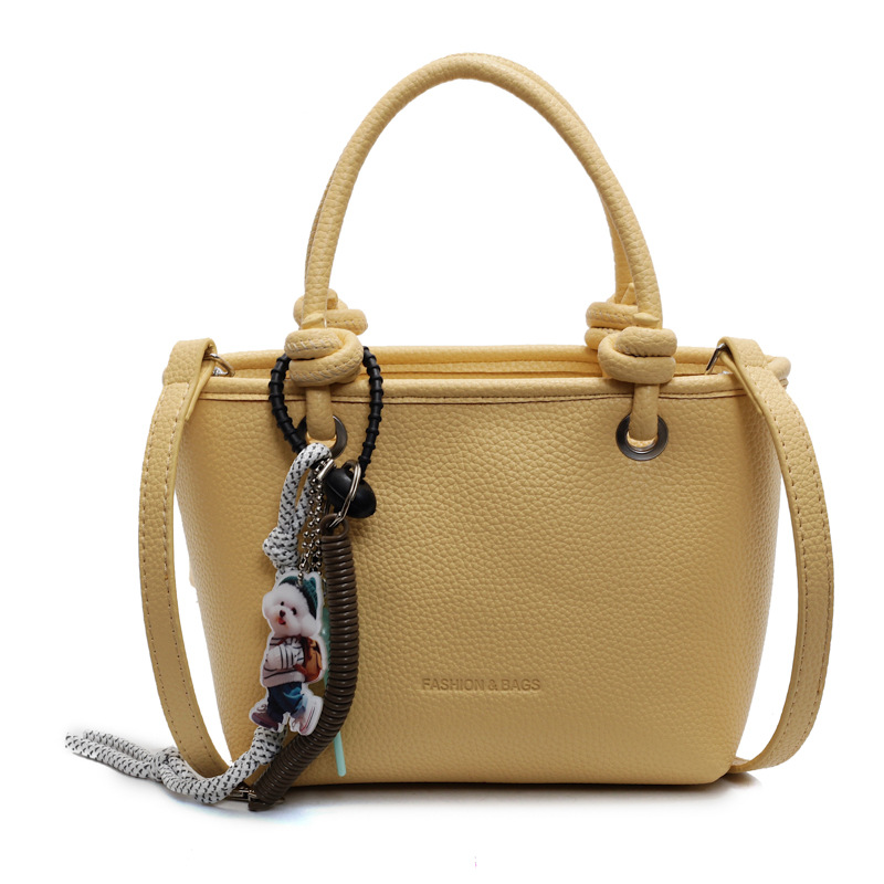 Bolso de cubo portátil para mujer, nuevo bolso de mensajero de textura salvaje 2025, bolso de canasta de verduras de moda retro de alta gama