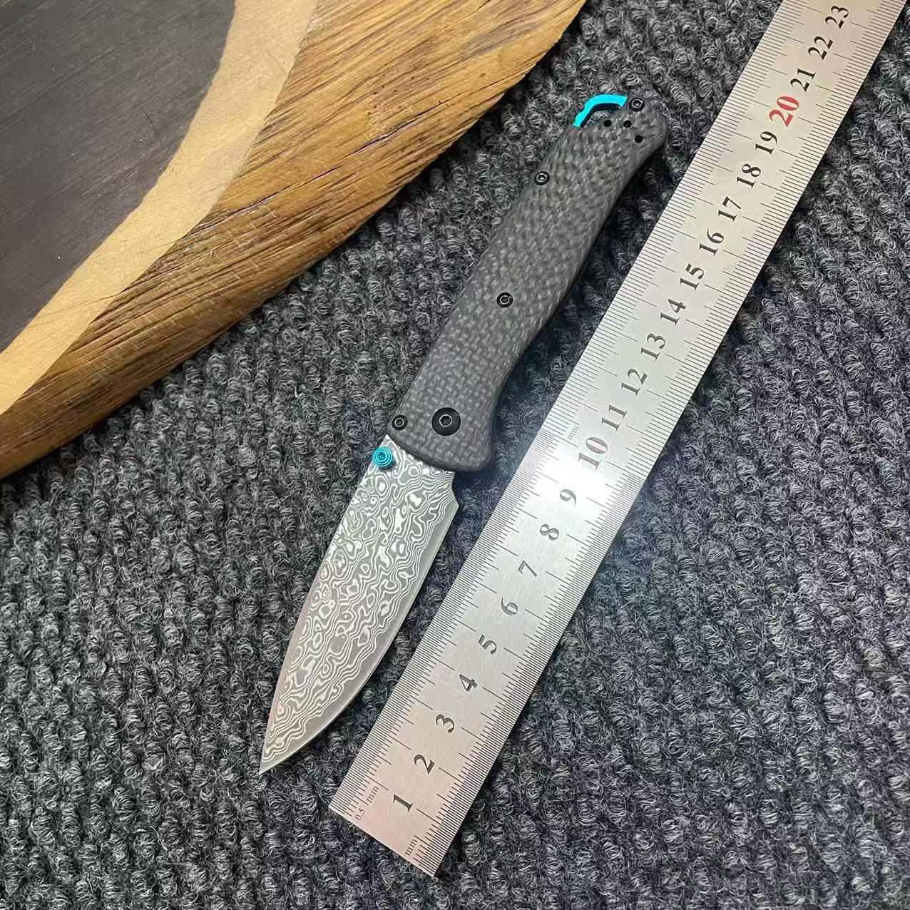 Spot butterfly 535 Damascus steel pocket knife carbon fiber handle…