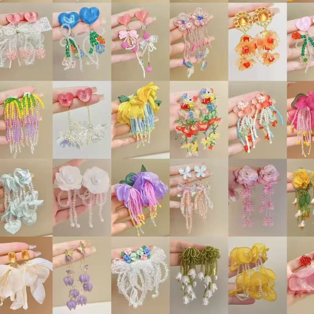 Pendientes de borla de flores de gasa de aguja de plata Pendientes de dopamina de bosque dulce Pendientes de todo fósforo de tendencia de nicho Mujeres al por mayor