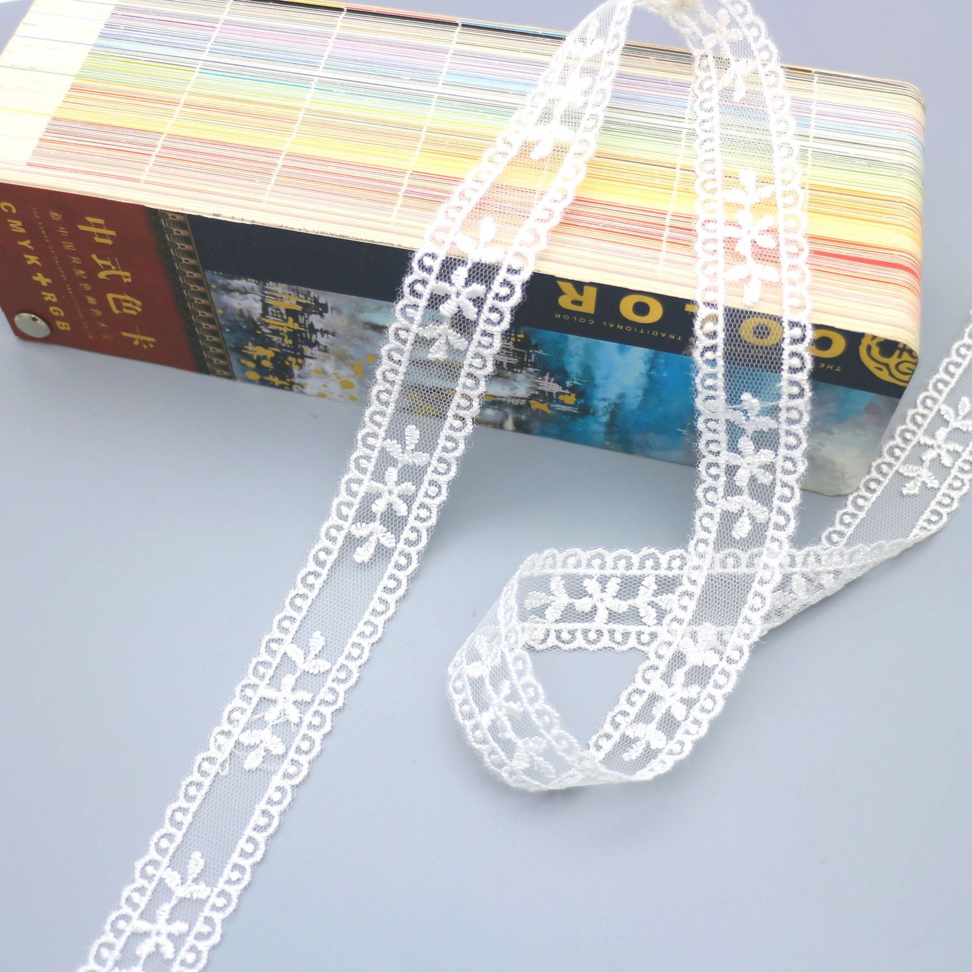 网纱涤光丝双边刺绣蕾丝花边服装辅料童装发饰蝴蝶结