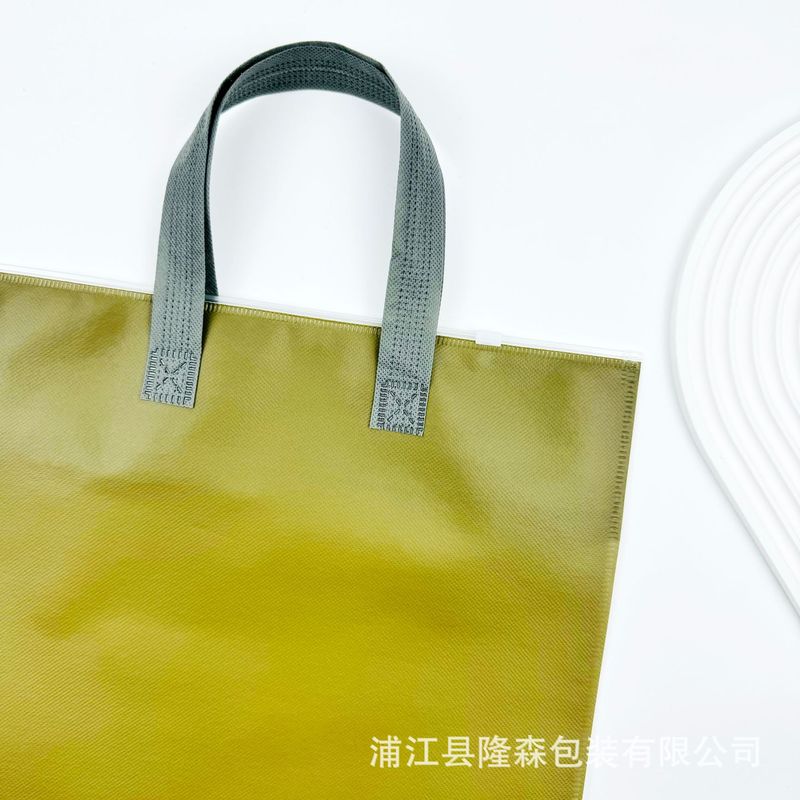 服装通用服饰手提拉链袋 打底裤棉裤无纺布手提袋 保暖内衣包装袋|undefined