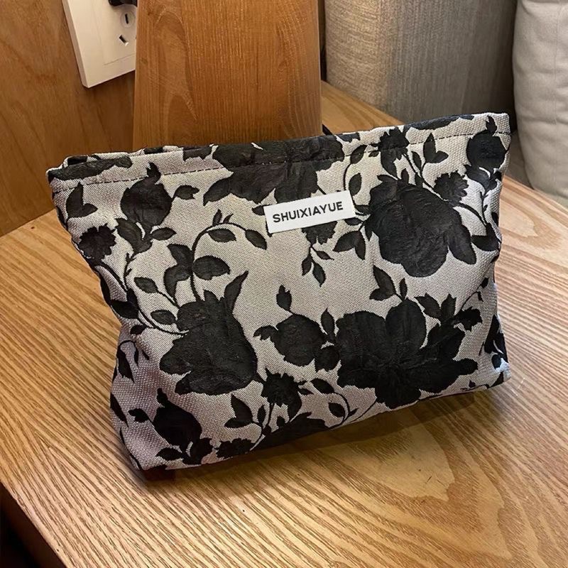 Bolsa de cosméticos de gran capacidad portátil fresco pequeño floral ins bolsa de almacenamiento bolsa de lavado elegante bolsa de almacenamiento jacquard